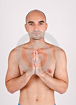 Spiritual man praying and meditating.