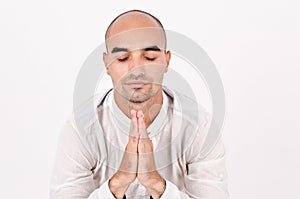 Spiritual man praying and meditating.