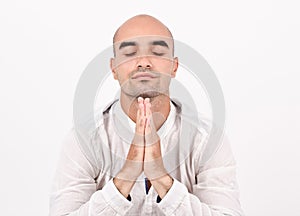 Spiritual man praying and meditating.