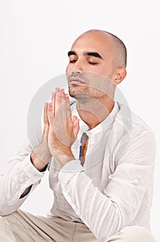 Spiritual man praying and meditating.