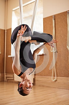 Spiritual, mental and physical practise in antigravity yoga