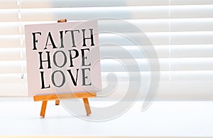 spiritual reminder or metaphysical concept - faith, hope and love photo