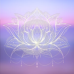 Spiritual symbol of lotus with tribal decoration on gently blurred ocean and sunset background. Calm and meditation. Water lily