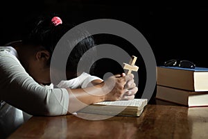 Spirituality and religion,Women in religious concepts Hands praying to God while holding the cross symbol. Nun caught the cross in