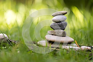 Spirituality: Stone cairn in the park. Balance and relaxation