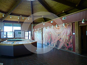 Spiro Mounds Archaeological Center interior display with artwork