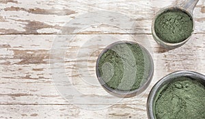 Spirulina algae powder in the bowl