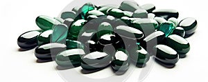 Spirulina capsules food suplement on white background