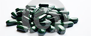 Spirulina capsules food suplement on white background