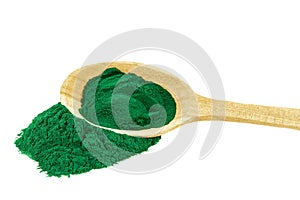 Spirulina powder blue-green algae in wooden spoon on white