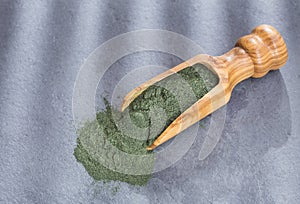 Spirulina powder in the spoon - Spirulina