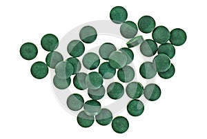 Spirulina tablets isolated on white background