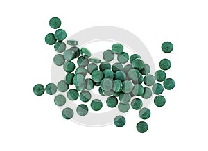 Spirulina tablets isolated on white background