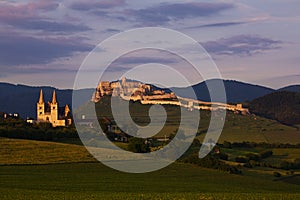 Spis castle and The Spis chapter at the sunset