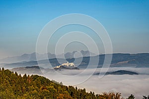 Spis Castle in front of majestic High Tatras mountain.