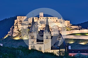 Spissky hrad castle and Spisska Kapitula in the evening