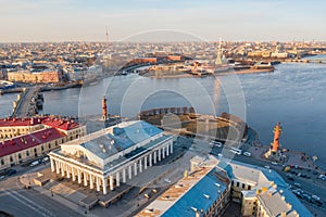 Spit of Vasilyevsky Island, the Stock Exchange building. Rostral columns. And the Peter and Paul Fortress on Hare Island. View