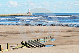 Spittal beach and pier with lighthouse