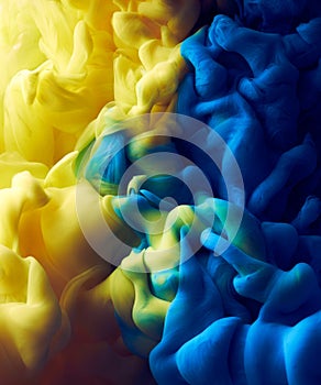 Splash of blue and yellow color paint pigment