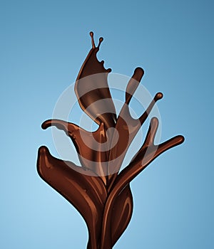 Splash of brownish hot coffee or chocolate isolated
