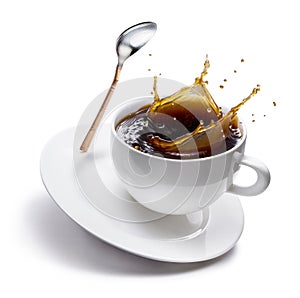 Splash of coffee in a form of crown in a white coffee cup. Clipping path
