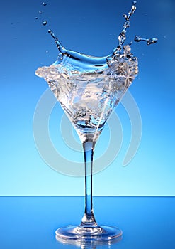 Splash martini on blue