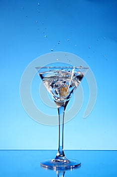 Splash martini on blue