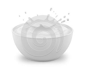 A splash of milk in a white bowl