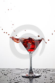 Splash Photography of Red Wine Drops Against White Background.
