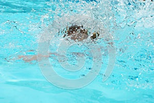 Splash after someone jumped into a swimming pool