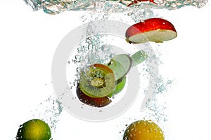 Splash water with freshnes fruits photo