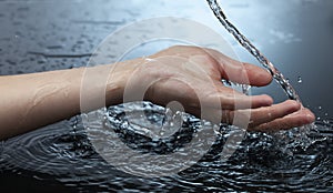 Splash of Water in Woman Hand