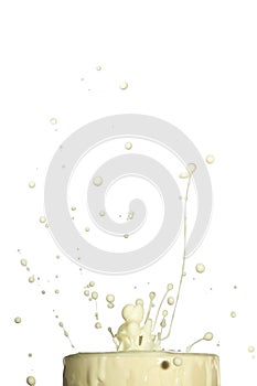 Splash of white liquid isolated on white