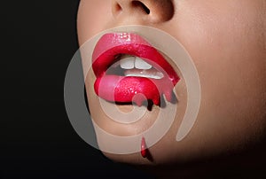 Splash. Woman's Red Lips with Dripping Lipstick. Creativity