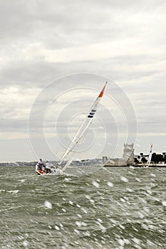 Splashes on Camera, Sailing Boat on Water on a Stormy Day photo