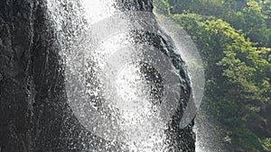 Splashes of water from the waterfall close up