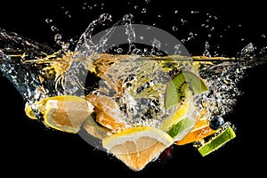 Splashing fruit on water.