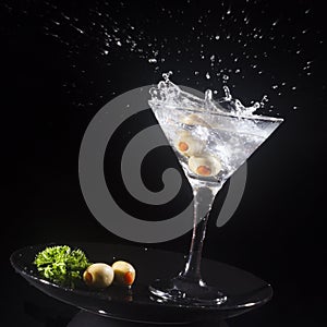 Splashing martini cocktail drink