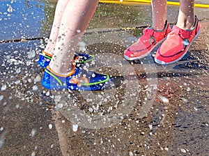 Splashing in a Summer Spray Puddle