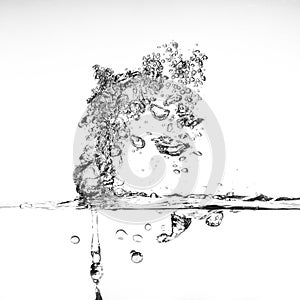 splashing water with bubbles on white background closeup