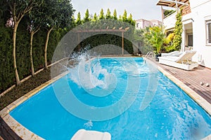 Splashing water in pool