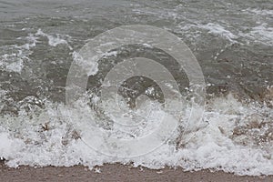 Splashing water on the sea coast