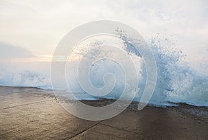 Splashing wave on dyke  in Saint-Malo photo