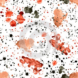 Splattered watercolor paint black and red in the form of spots and streaks