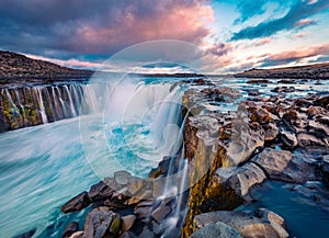 Splendi summer view of Selfoss Waterfall. Picturesque sunrise on Jokulsa a Fjollum river, Jokulsargljufur National Park. Colorful