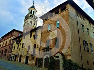 Splendid ancient street in Saluzzo town, Piedmont region, Italy. Colours, history, enchanting architecture and art