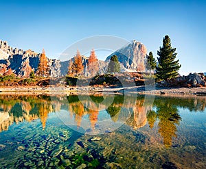 Splendid autumn view of Limides Lake and Lagazuoi mountain. Colorful morning view of Dolomite Alps, Falzarego pass, Cortina d`