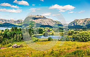 Splendid countryside Norwegian landscape. Colorful summer morning in Norway. Beauty of nature concept background