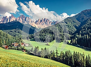 Splendid morning view of St. Magdalena village. Sunny summer scene of Funes Valley Villnob with Odle Group mountains on