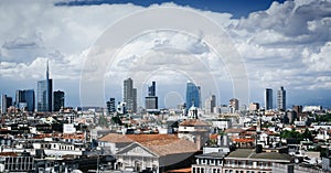 Splendid overview of Milan from the top of Duomo Cathedral, main architectural landmark of the city. Scenic cityspace. Beautiful